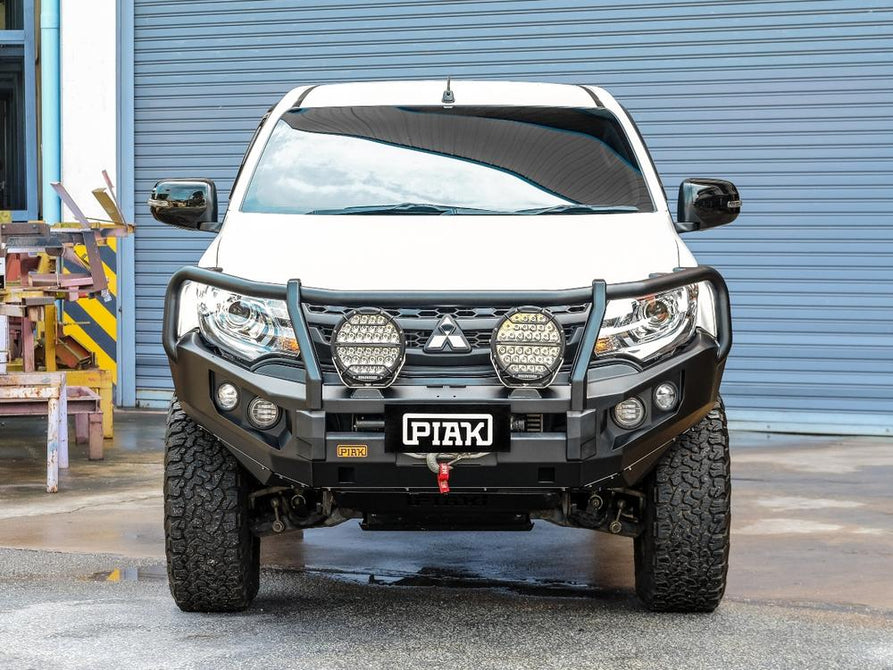 Front view of PIAK Elite Loop Bar installed on Mitsubishi Pajero Sport (2020-2024)