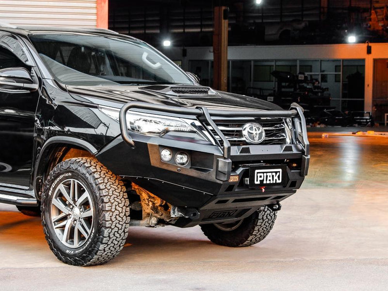 Toyota Fortuner GUN156R close-up of black recovery points and bash plate on PIAK Elite Loop Bar