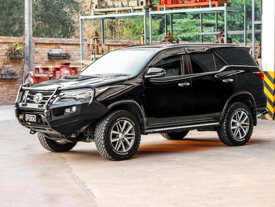 Toyota Fortuner GUN156R left side perspective showcasing the sleek design of the PIAK Elite Loop Bar.